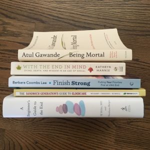 stack of death-related books
